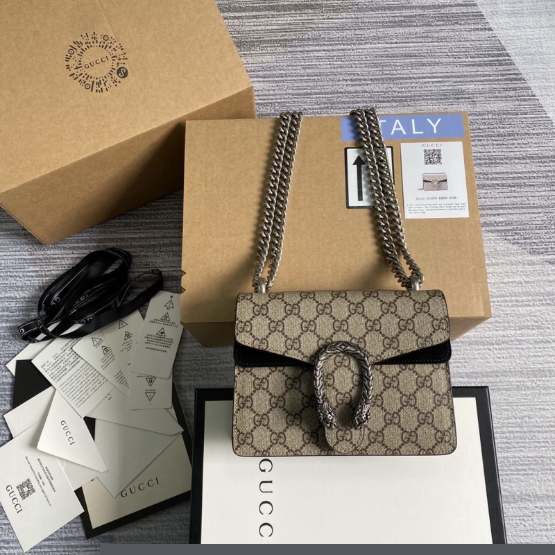 G*u*i top handle bags